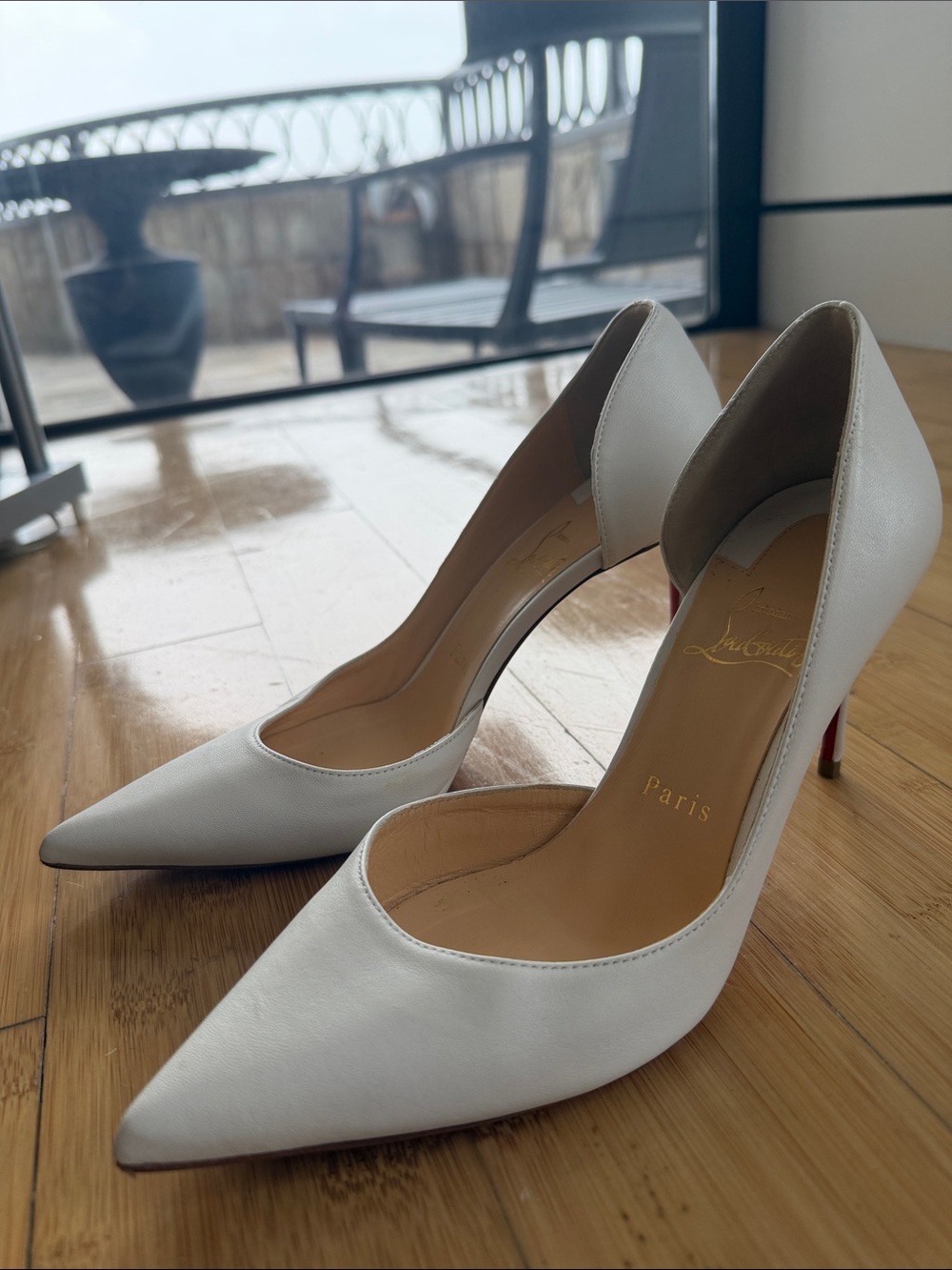 Christian Louboutin White Pointed D'Orsay Pumps with Red Soles